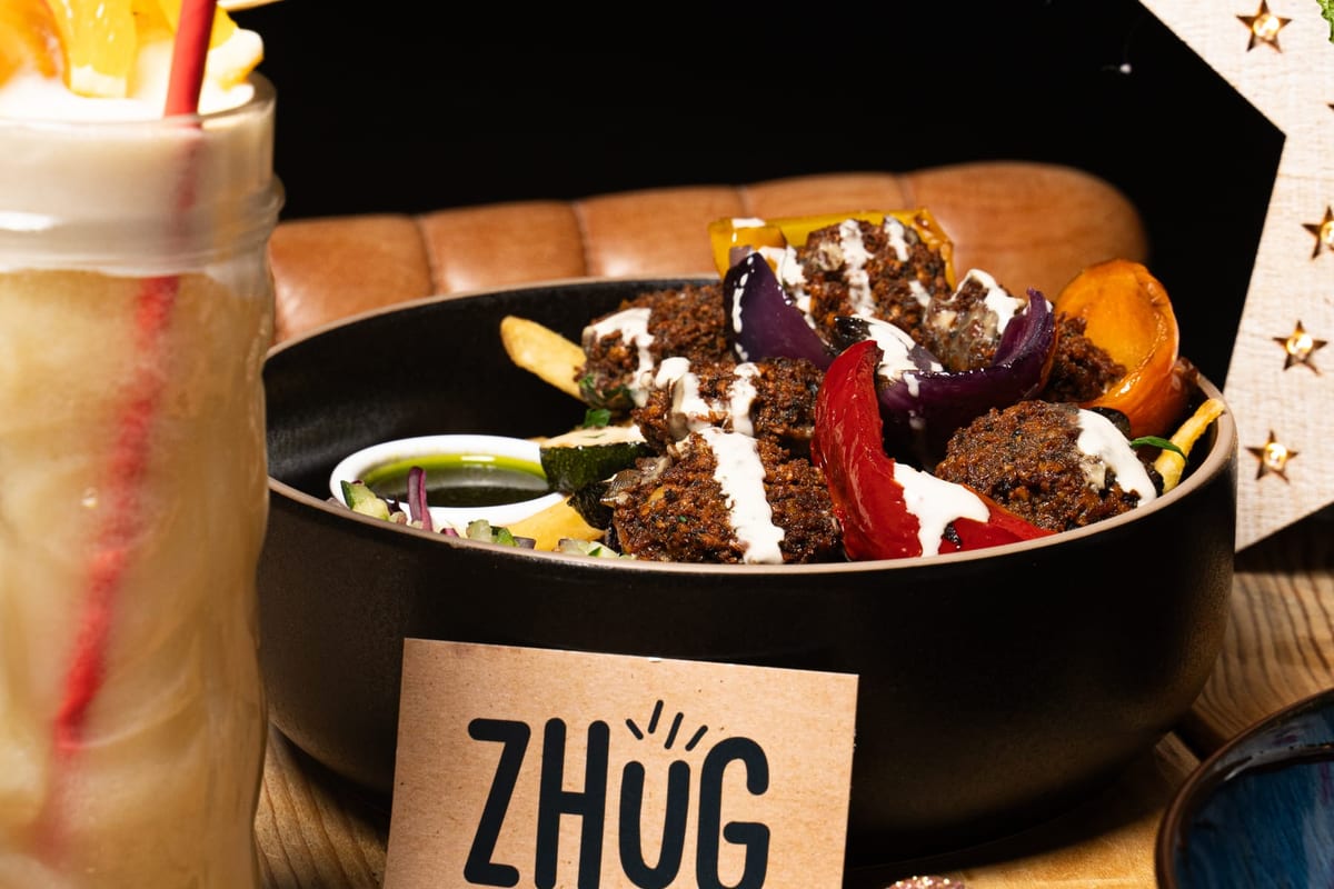 A ZHUG spread of mezze, falafel and salads laid out for sharing